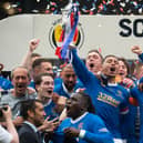 Rangers captain James Tavernier lifts the Scottish Cup after the 2-0 win over Hearts.