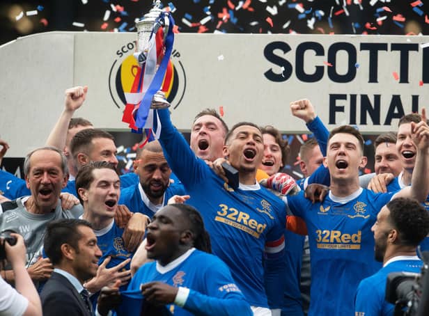 <p>Rangers captain James Tavernier lifts the Scottish Cup after the 2-0 win over Hearts.</p>