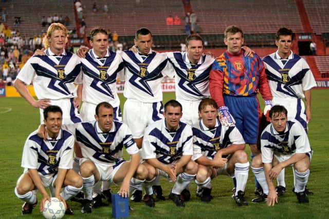 McKinaly (back row, right) lines up ahead of a friendly against Colombia in Miami in May 1996