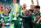 Northern Ireland-born Celtic manager Brendan Rodgers with the Scottish Premiership trophy on Saturday. (Photo by Andrew Milligan/PA Wire)