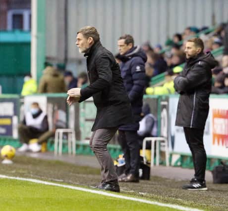 Graham Alexander's men lost to a solitary goal at Celtic Park