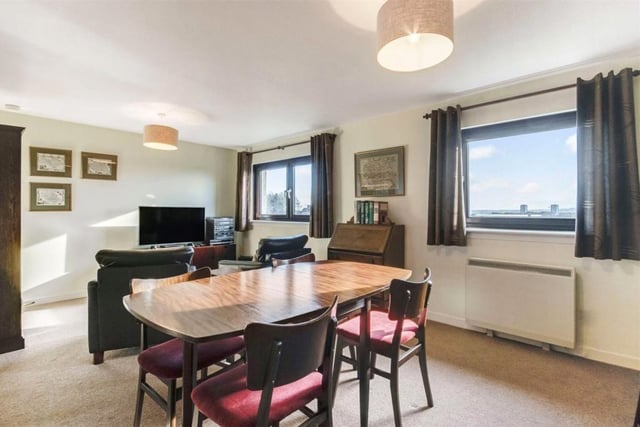 The living room and dining space.