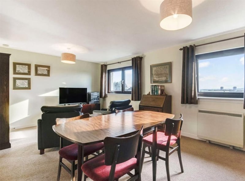 The living room and dining space.