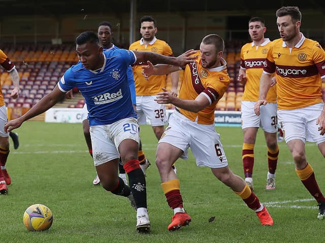 Alfredo Morelos of Rangers vies with Allan Campbell for the ball during their sides' Scottish Premiership match at Fir Park on January 17. (Photo by Ian MacNicol/Getty Images)