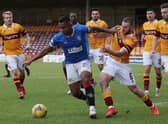 Alfredo Morelos of Rangers vies with Allan Campbell for the ball during their sides' Scottish Premiership match at Fir Park on January 17. (Photo by Ian MacNicol/Getty Images)