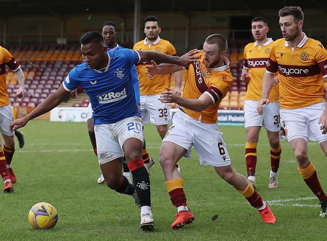 Alfredo Morelos of Rangers vies with Allan Campbell for the ball during their sides' Scottish Premiership match at Fir Park on January 17. (Photo by Ian MacNicol/Getty Images)