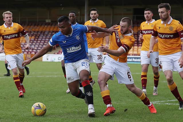 Alfredo Morelos of Rangers vies with Allan Campbell for the ball during their sides' Scottish Premiership match at Fir Park on January 17. (Photo by Ian MacNicol/Getty Images)