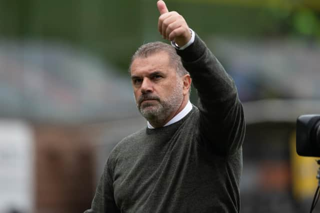 Ange Postecoglou gestures to the Celtic fans at Tannadice after the 9-0 win over Dundee United. (Photo by Paul Devlin / SNS Group)