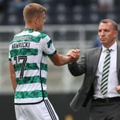 Celtic manager Brendan Rodgers and Maik Nawrocki