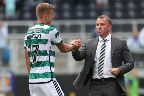 Celtic manager Brendan Rodgers and Maik Nawrocki