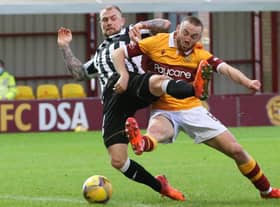 Allan Campbell in action for Motherwell against St Mirren's Richard Tait (Pic by Ian McFadyen)
