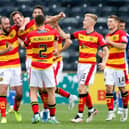 Partick's Aaron Muirhead (centre) celebrates his equaliser at Kilmarnock. (Photo by Ewan Bootman / SNS Group)