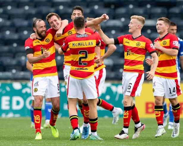 Partick's Aaron Muirhead (centre) celebrates his equaliser at Kilmarnock. (Photo by Ewan Bootman / SNS Group)