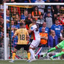Rangers Scott Arfield (not in frame) flicks his header past Livingston's Shamal George to make it 1-1 and flip the encounter eventually won 2-1 by Giovanni van Bronckhorst's men. (Photo by Craig Williamson / SNS Group)