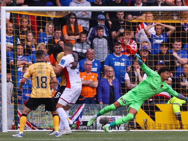 Rangers Scott Arfield (not in frame) flicks his header past Livingston's Shamal George to make it 1-1 and flip the encounter eventually won 2-1 by Giovanni van Bronckhorst's men. (Photo by Craig Williamson / SNS Group)