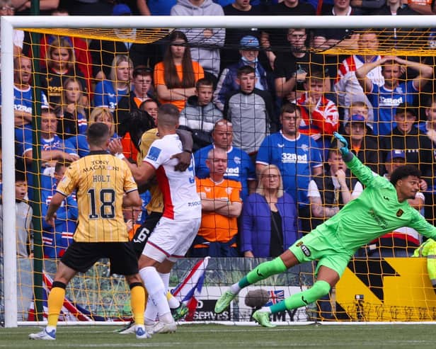 Rangers Scott Arfield (not in frame) flicks his header past Livingston's Shamal George to make it 1-1 and flip the encounter eventually won 2-1 by Giovanni van Bronckhorst's men. (Photo by Craig Williamson / SNS Group)