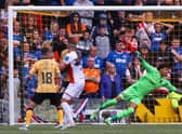 Rangers Scott Arfield (not in frame) flicks his header past Livingston's Shamal George to make it 1-1 and flip the encounter eventually won 2-1 by Giovanni van Bronckhorst's men. (Photo by Craig Williamson / SNS Group)