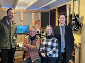 Members of Leadhills Family Action Group celebrate their successes with Banks Renewables team, who popped into the ‘studio’ for a visit.