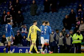 Rangers players walk off dejected following the Scottish Gas Men's Scottish Cup fifth round match at Ibrox Stadium, Glasgow