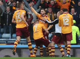 Louis Moult of Motherwell celebrates scoring his second goal during the Betfred League Cup semi-final between Rangers and Motherwell at Hampden Park on October 22, 2017. (Photo by Ian MacNicol/Getty Images)