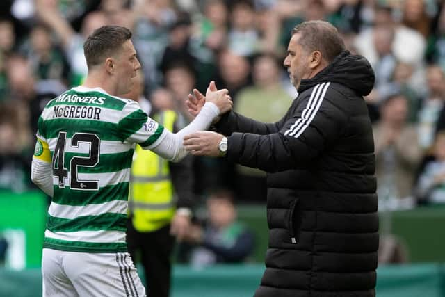 Celtic manager Ange Postecoglou shakes hands with captain Callum McGregor.  (Photo by Craig Williamson / SNS Group)