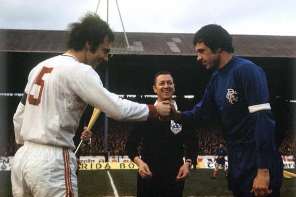 Dave Smith (right) - captain of Rangers in place of the injured John Greig - shakes hands with Bayern Munich legend Franz Beckenbauer before kick-off at Ibrox in the second leg of the Cup Winners' Cup semi-final in April 1972. (Photo by SNS Group).