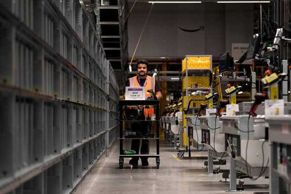 Tour of new £500m Amazon fulfilment centre on outskirts of Leeds. Workers pictured in the factory. Picture taken by Yorkshire Post Photographer Simon Hulme