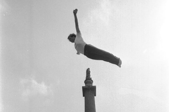 Scottish trampolining champion Ian Hamilton seems to be leaping the Walter Scott monument in George Square at the launch of the Sport For All campaign in July 1979.