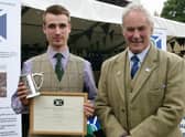 Cole Stewart from Braidwood receives his award from SGA chairman Alex Hogg. (Pic: SGA Media)