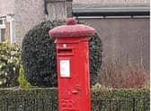 Cosy look for a local postbox!