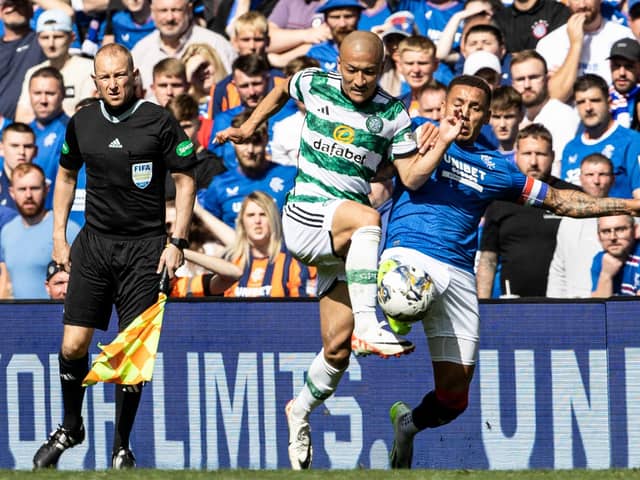 Rangers' James Tavernier and Celtic's Daizen Maeda in action during the first Old Firm derby this season.