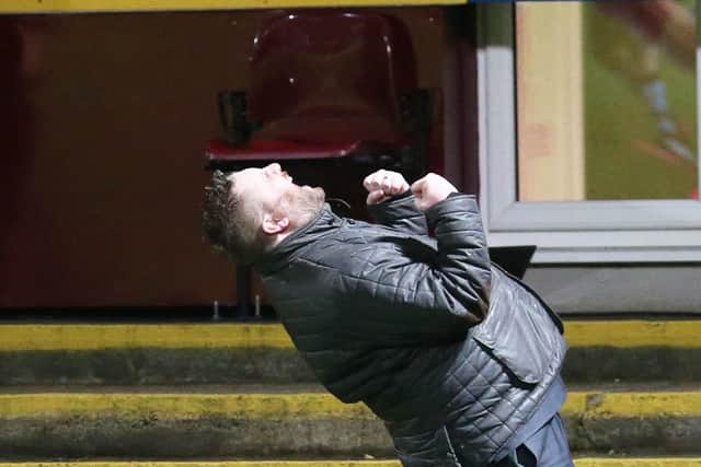 Motherwell chief executive Alan Burrows celebrates winning goal