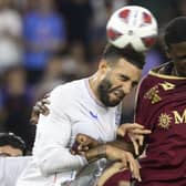 Rangers' Connor Goldson, left, and Servette's Chris Bedia battle for the ball during the Champions League qualifying second leg match in Geneva.