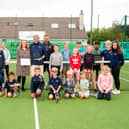 Giffnock Tennis Squash and Hockey Club is presented with the trophy it won during a virtual ceremony in June
