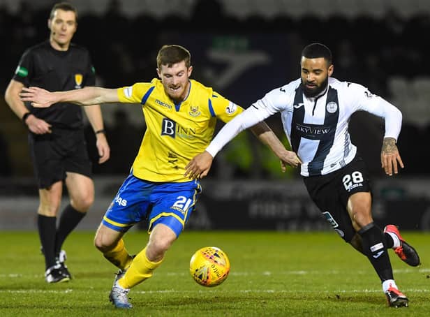 <p>St Johnstone’s Anthony Ralston competes with Alex Jakubiak during the Ladbrokes Premiership match at The Simple Digital Arena. Picture: SNS</p>