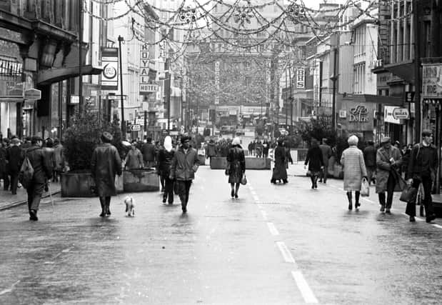 People doing Christmas shopping in a traffic-free Sauchiehall Street in December 1972.