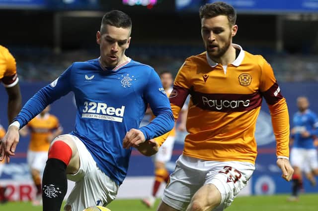 Ryan Kent is put under pressure by Stephen O'Donnell during the Ladbrokes Scottish Premiership match between Rangers and Motherwell at Ibrox Stadium on December 19 (Photo by Ian MacNicol/Getty Images)