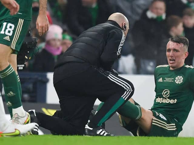 Celtic's David Turnbull shows his distress after sustaining the hamstring strain in the League Cup final little over a week ago that is likely to sideline him until March. (Photo by Craig Foy / SNS Group)