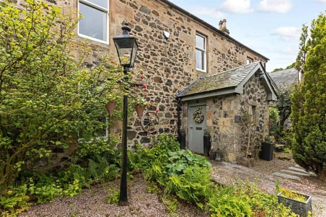 The farmhouse also comes with a garage.