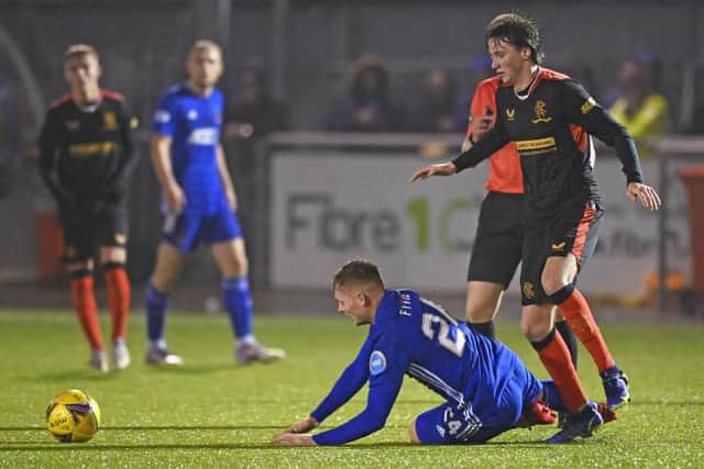 Scotland under-19 international midfielder Alex Lowry (right) in action for Rangers B team in a SPFL Trust Trophy match against Cove Rangers earlier this season. (Photo by Paul Devlin / SNS Group)