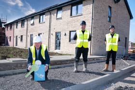 Councillor Danny Devlin is joined by CCG's trainee deputy site manager Darrell Wilson and site manager Joe Hunter as he visits the Balgraystone Road development in Barrhead © Gibson Digital 2021