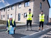 Councillor Danny Devlin is joined by CCG's trainee deputy site manager Darrell Wilson and site manager Joe Hunter as he visits the Balgraystone Road development in Barrhead © Gibson Digital 2021