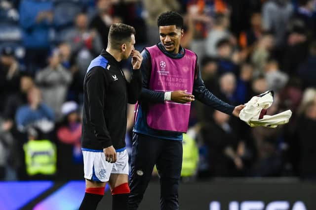 PSV's on-loan Malik Tillman talks to former Rangers teammate Ryan Jack at Ibrox last night after the 2-2 draw. Tillman was an unused sub   (Photo by Rob Casey / SNS Group)