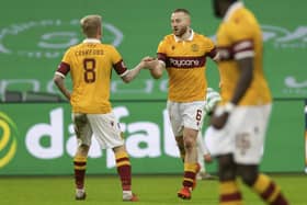 Motherwell's Allan Campbell celebrates a goal with Robbie Crawford during their side's Scottish Premiership match against Celtic on Saturday, February 6 , 2021. Photo: Steve Welsh. 