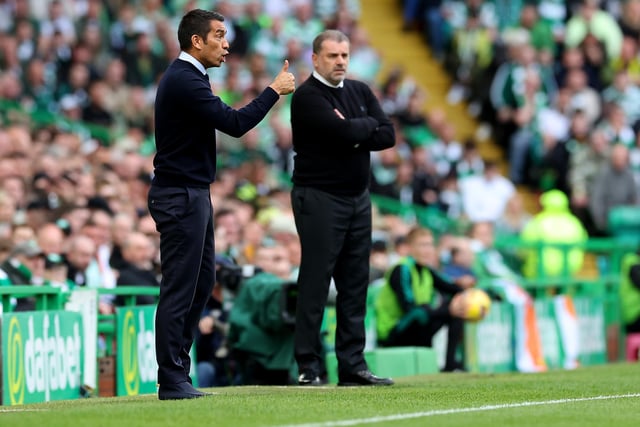 Giovanni van Bronckhorst and Ange Postecoglou watching on.