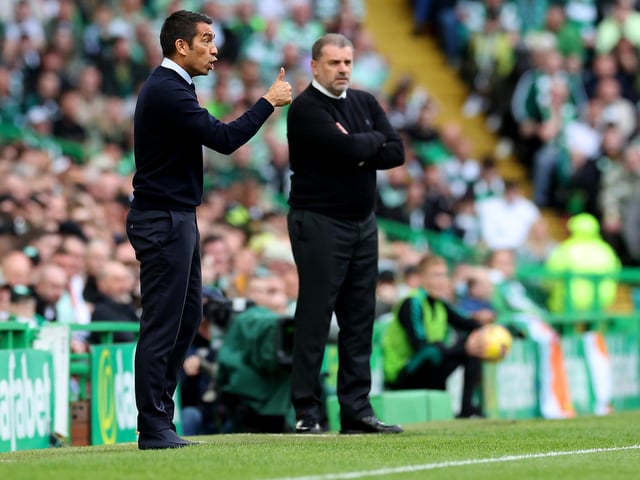Giovanni van Bronckhorst and Ange Postecoglou watching on.
