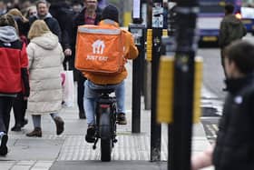 Glasgow delivery bike riders have been issued a warning to learn the Highway Code (Photo by John Devlin/The Scotsman)