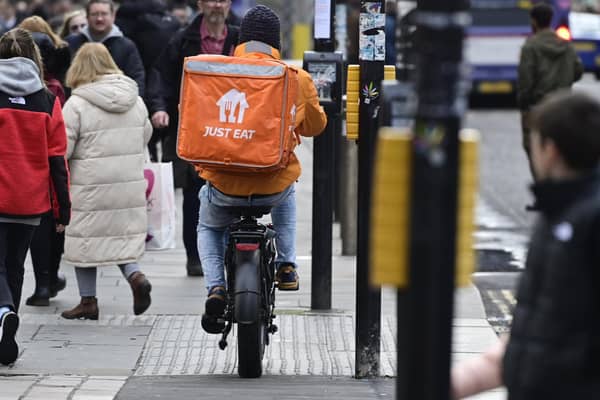Glasgow delivery bike riders have been issued a warning to learn the Highway Code (Photo by John Devlin/The Scotsman)