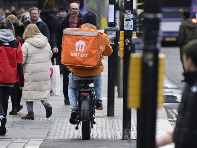 Glasgow delivery bike riders have been issued a warning to learn the Highway Code (Photo by John Devlin/The Scotsman)