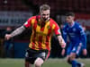 Kevin Holt converts another late winner to haunt hometown team Queen of the South as Partick Thistle move clear in Championship play-off hunt